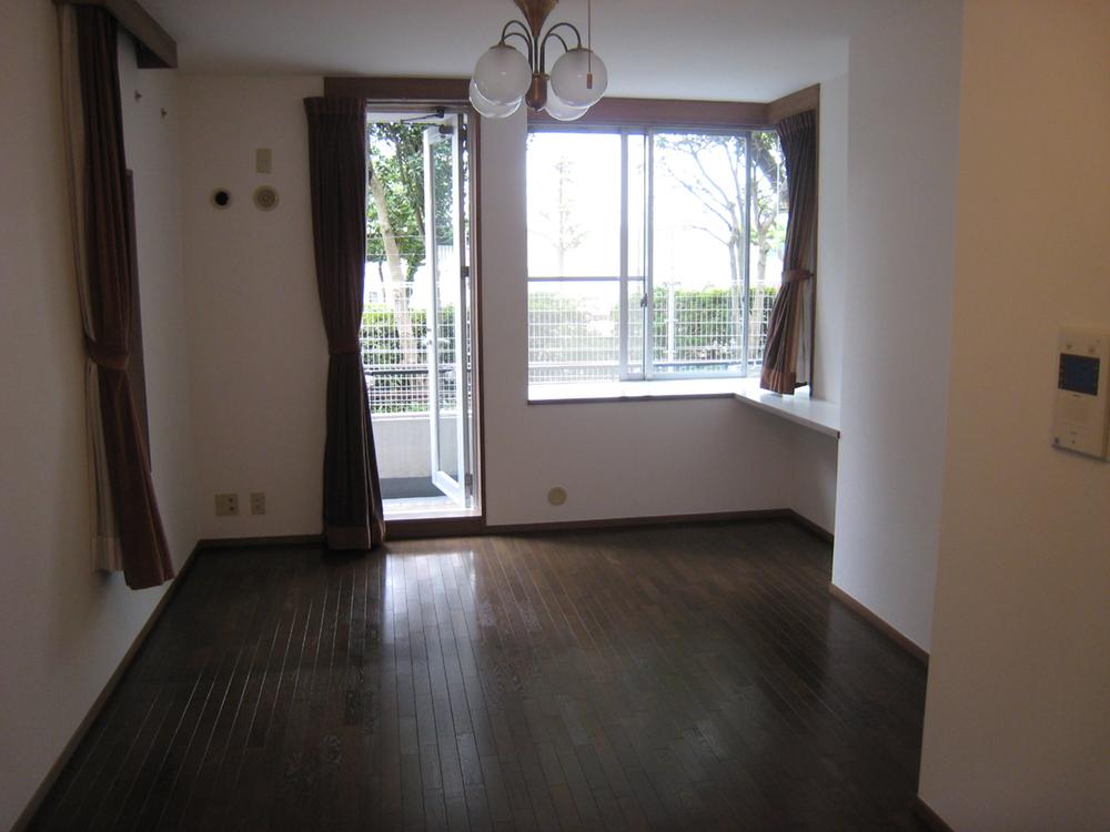 Living. Southeast of the living-dining. It is your easy-to-clean flooring upholstery.