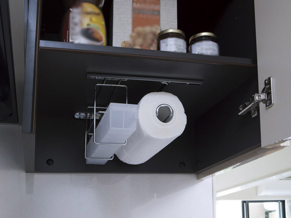 Kitchen.  [Storage hanger] And taken out smoothly when using kitchen paper and wrap, Installing a storage hanger that can be neatly stored.