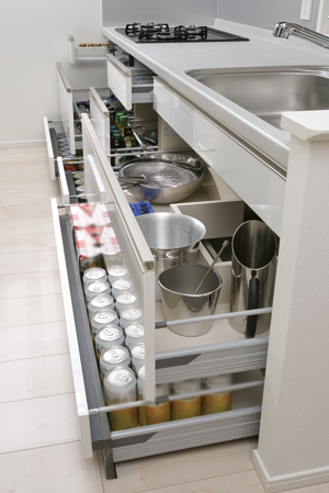 Kitchen.  [Sliding storage] Storage of system kitchens, It can be effectively utilized in the prone cabinet in a dead space, It has adopted a sliding storage.