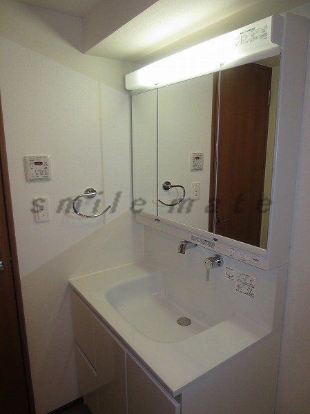 Washroom. Is a reference photograph of the same property by type of room