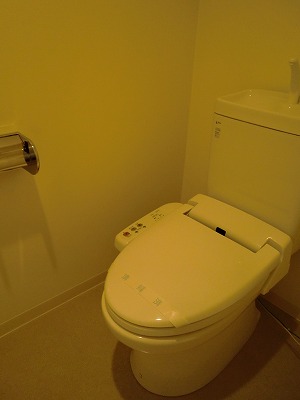 Toilet. Washlet with is a picture of the other rooms.
