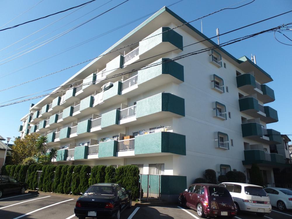Local appearance photo. It is a low-rise apartment nestled in a quiet residential area.
