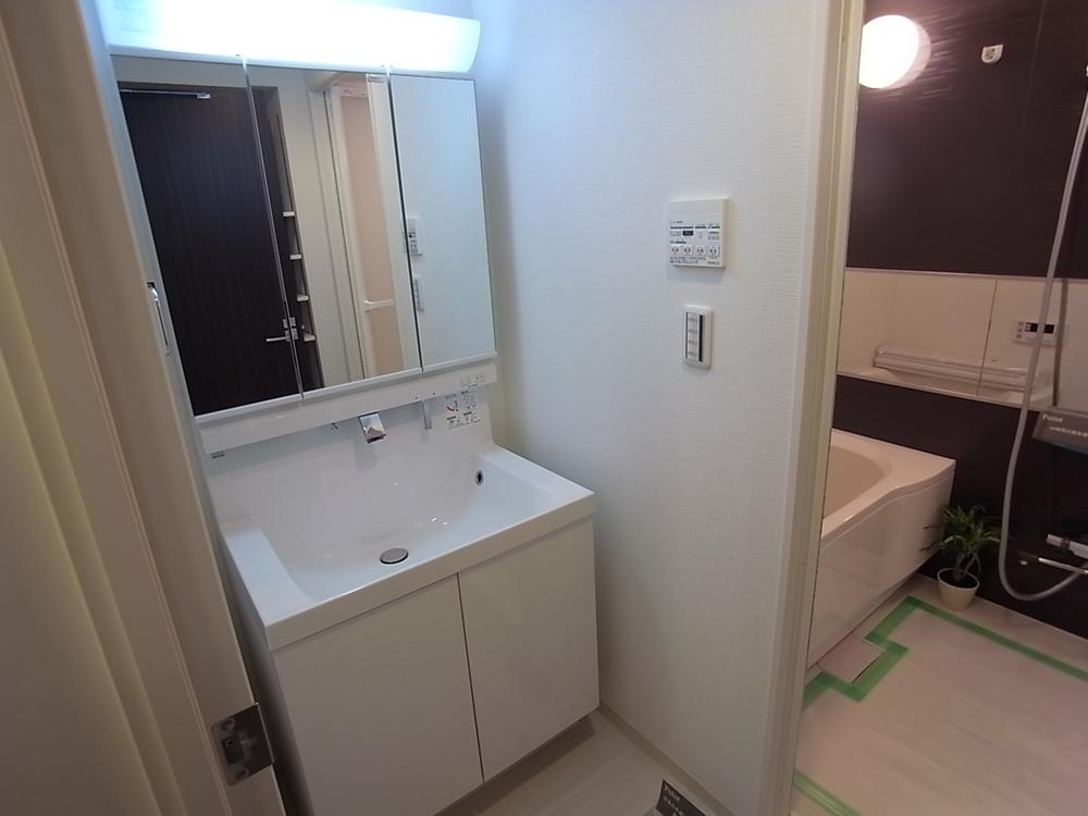 Wash basin, toilet. They exchanged washroom with a new one.