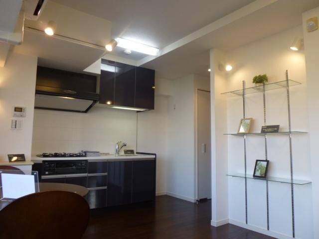 Living. Kitchen viewed from the dining