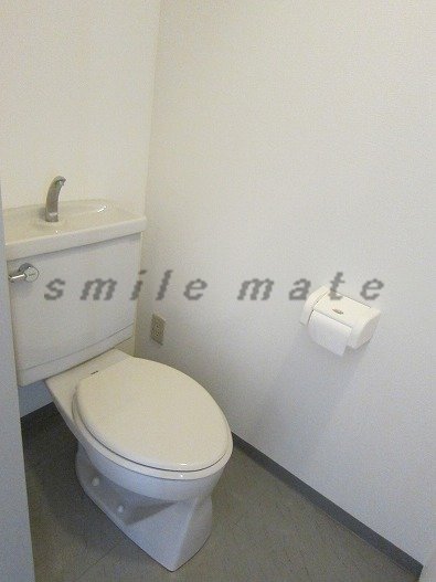 Toilet. Our brokerage half a month our HP property photo number posted