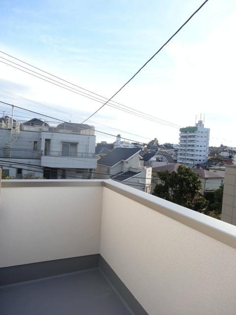 View photos from the dwelling unit. 1 Building View from the second floor balcony