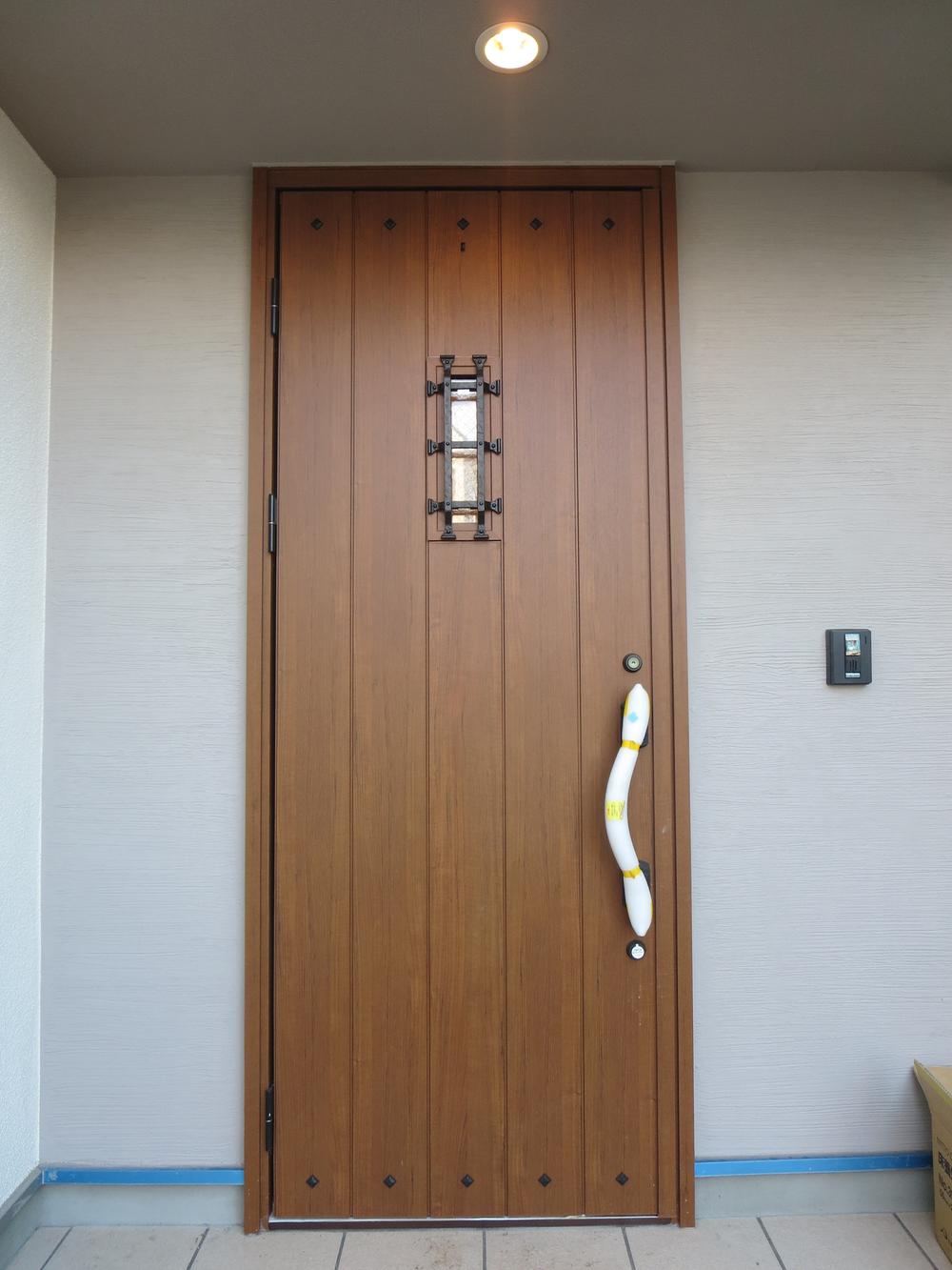Entrance. Stylish entrance door of woodgrain !!