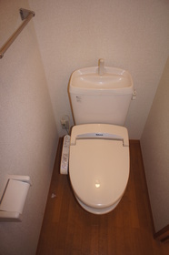 Toilet. It is a warm water washing toilet seat