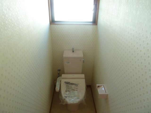 Toilet. Warm water washing toilet seat, Yes window.
