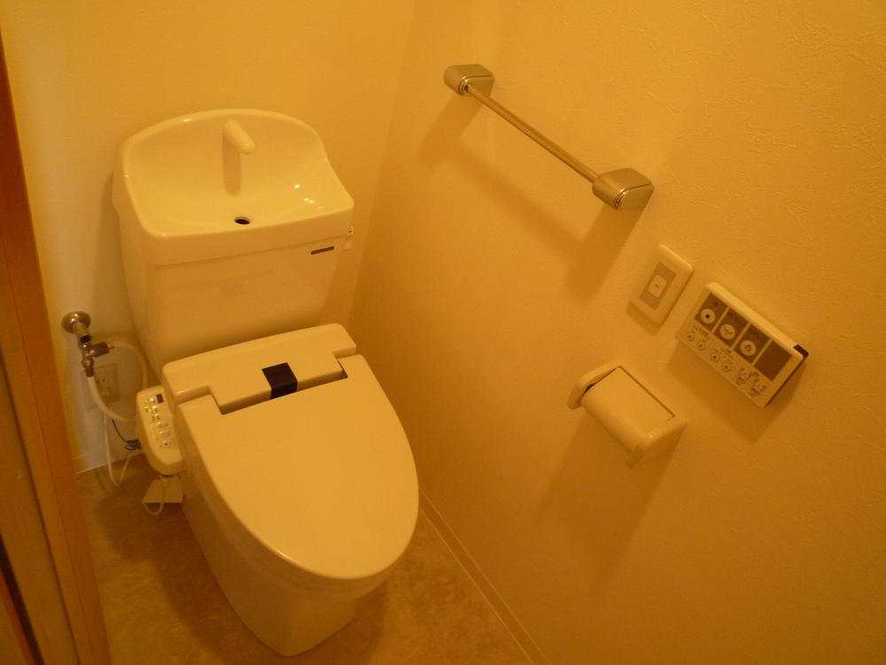 Toilet. Washlet equipped with built-in toilet facilities.