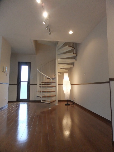Living and room. Spiral staircase