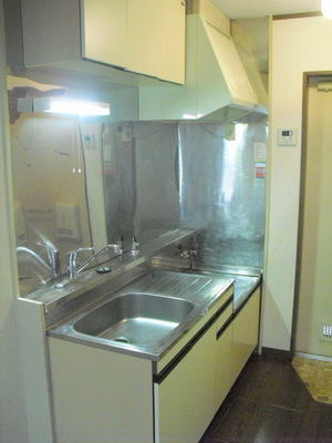 Kitchen. A housed in the upper and lower gas two-burner installation Allowed Kitchen