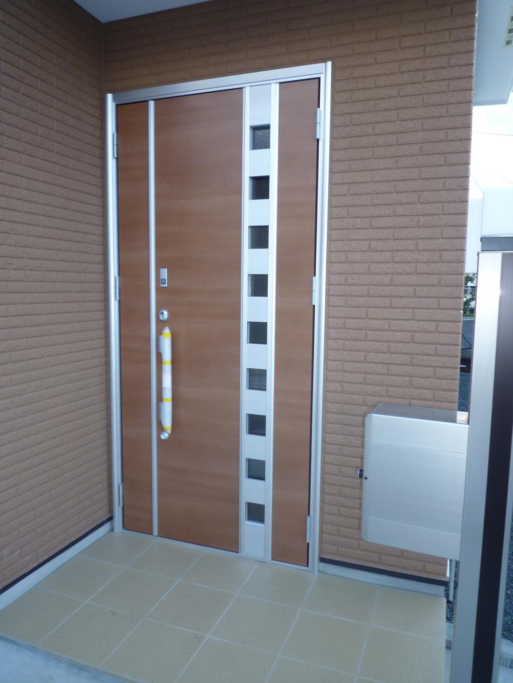 Entrance. Parent-child door with a card key