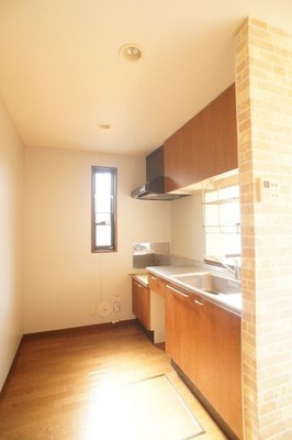 Kitchen. There is a window is light and airy in the kitchen