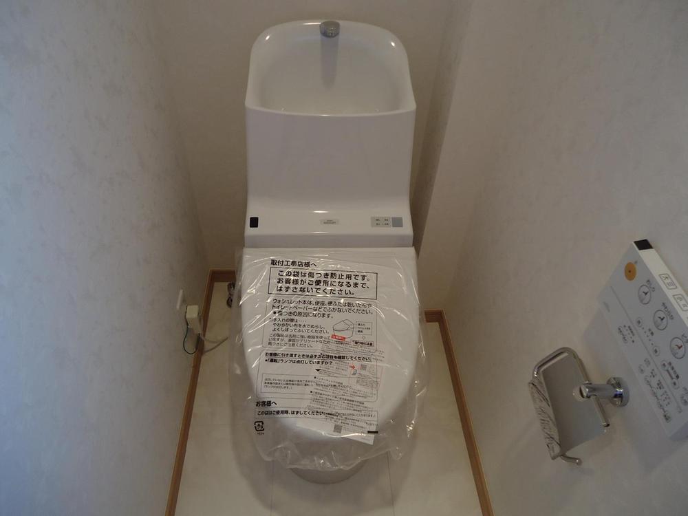 Toilet. Washlet comes with a