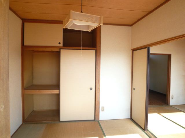 Living and room. There is also a upper closet