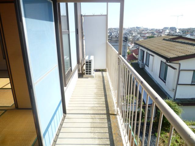 Balcony. It is a wide and bright