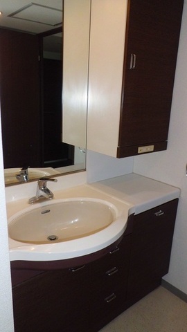 Washroom. With storage is independent wash basin