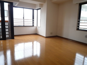 Living and room. Is a floor plan with a window are many open feeling in the corner room.