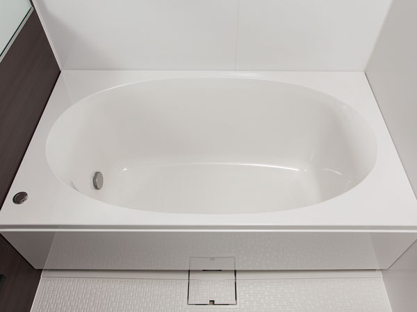 Bathing-wash room.  [Oval bathtub] It has adopted the oval tub that can leisurely bath. A simple positive elliptical form, such as gently wrap the body, Heals tired of the day.