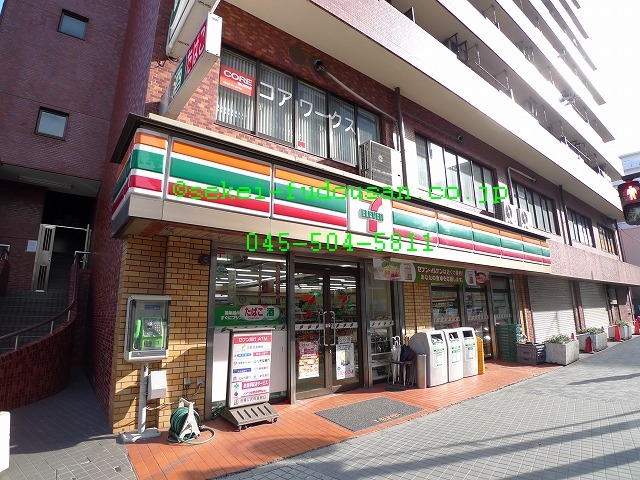 Convenience store. Seven-Eleven Tsurumichuo store up (convenience store) 129m