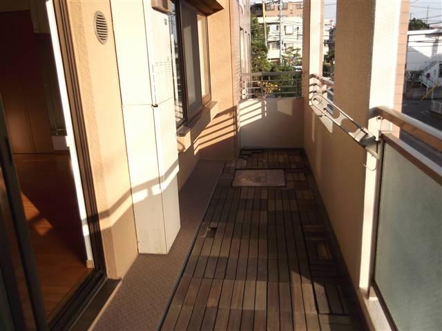 Balcony. Spacious balcony that was paved with wood tile!
