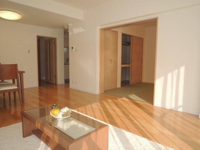 Living. Next to the living room is a Japanese-style room