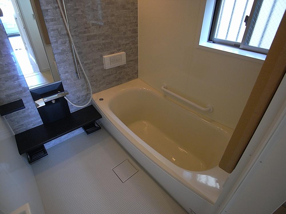 Bathroom. Stylish bathroom. Large TV also comes with.