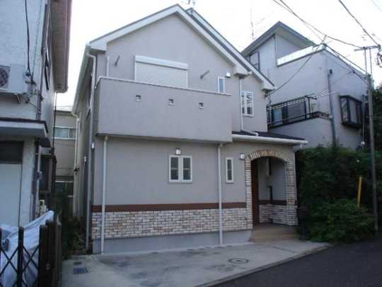 Local appearance photo. Accent clad gable roof and outer wall tile is characterized by.