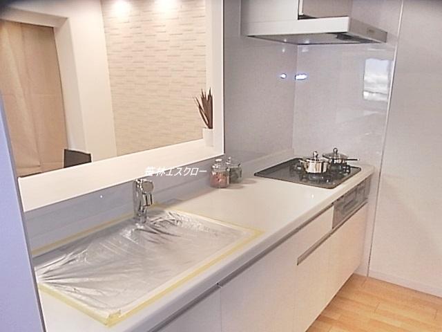 Kitchen. It is an open counter kitchen