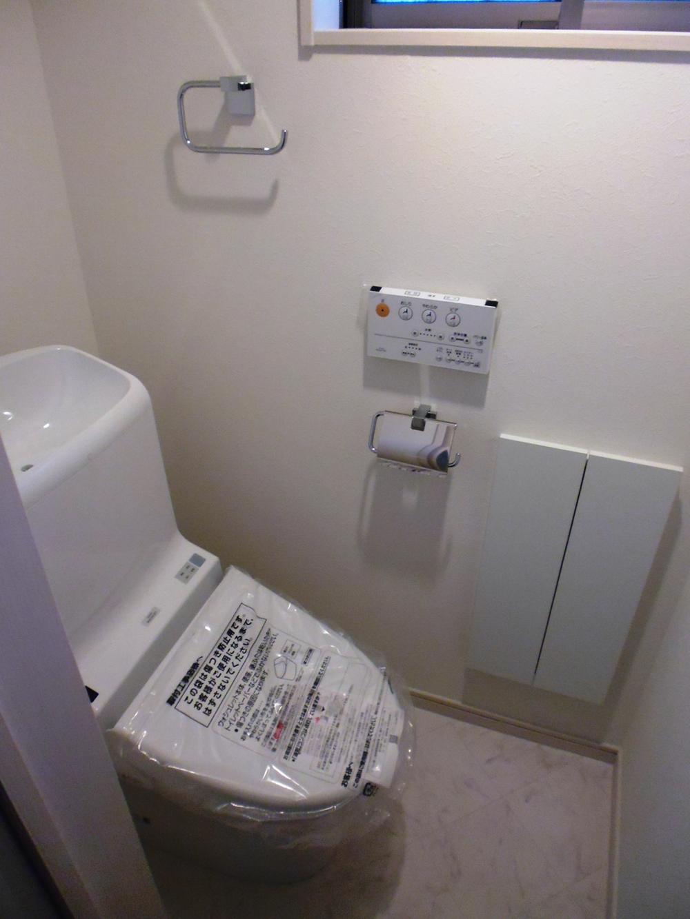 Toilet. Warm water washing toilet seat