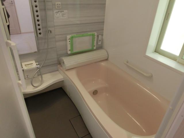 Bathroom. It has a whopping with a TV in the bathroom