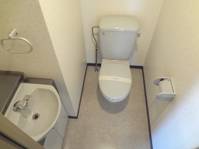 Toilet. There is a hand washing corner to the bathroom (^^)