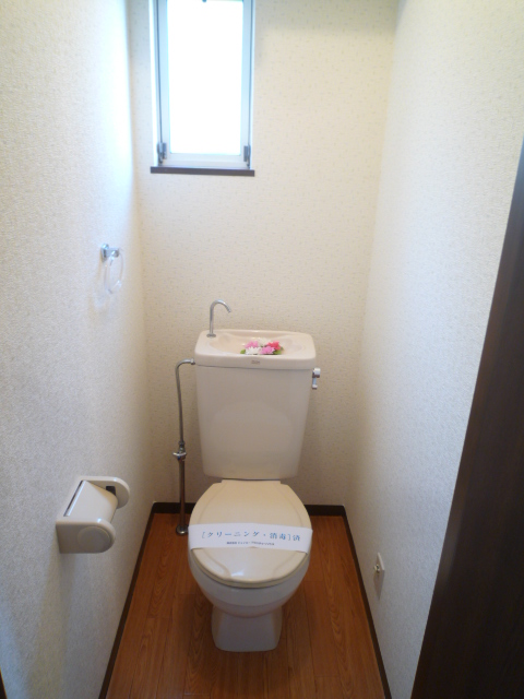 Toilet. Toilet with a small window