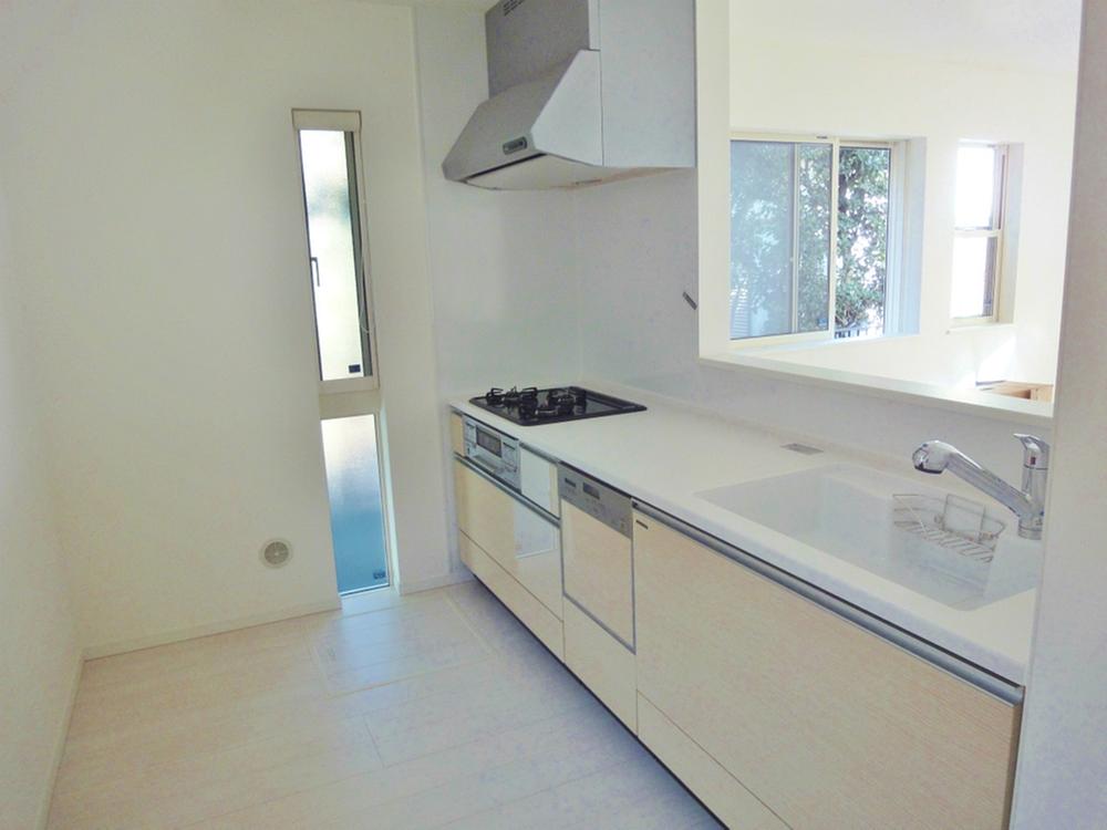 Kitchen. Artificial marble counter & sink. Also it comes with a dishwasher. (B Building local photo)