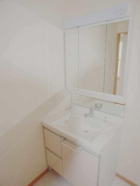 Wash basin, toilet. Same house builders construction cases