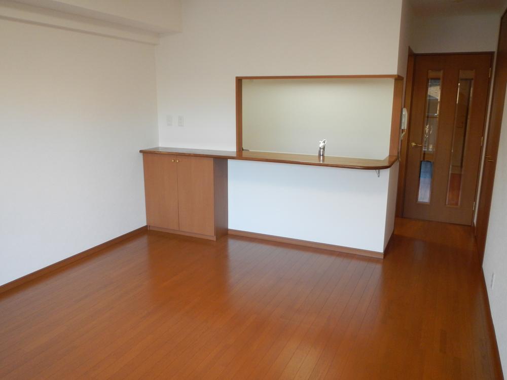 Living. Living room facing the face-to-face kitchen