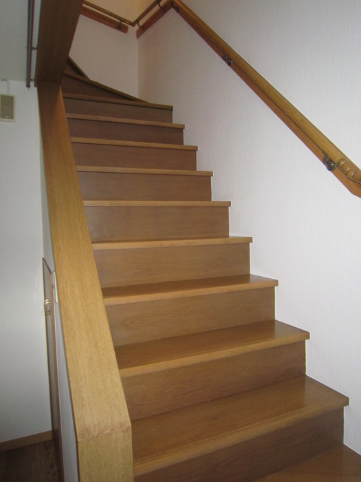 Other room space. Stairs go up from the first floor to the second floor