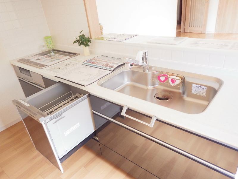Kitchen. With happy dishwasher in the kitchen