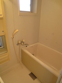 Bath. With additional heating function, There windows for ventilation.