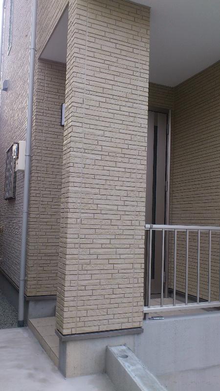 Entrance. Outer wall is also muted colors.