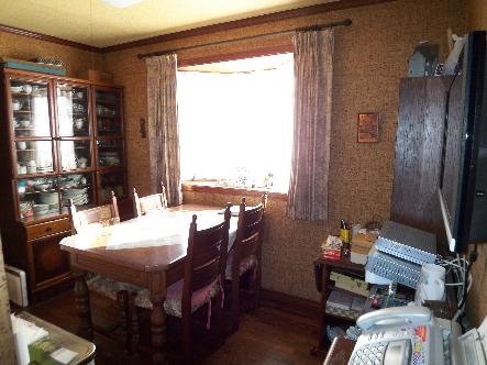 Non-living room. Dining is also bright with bay window