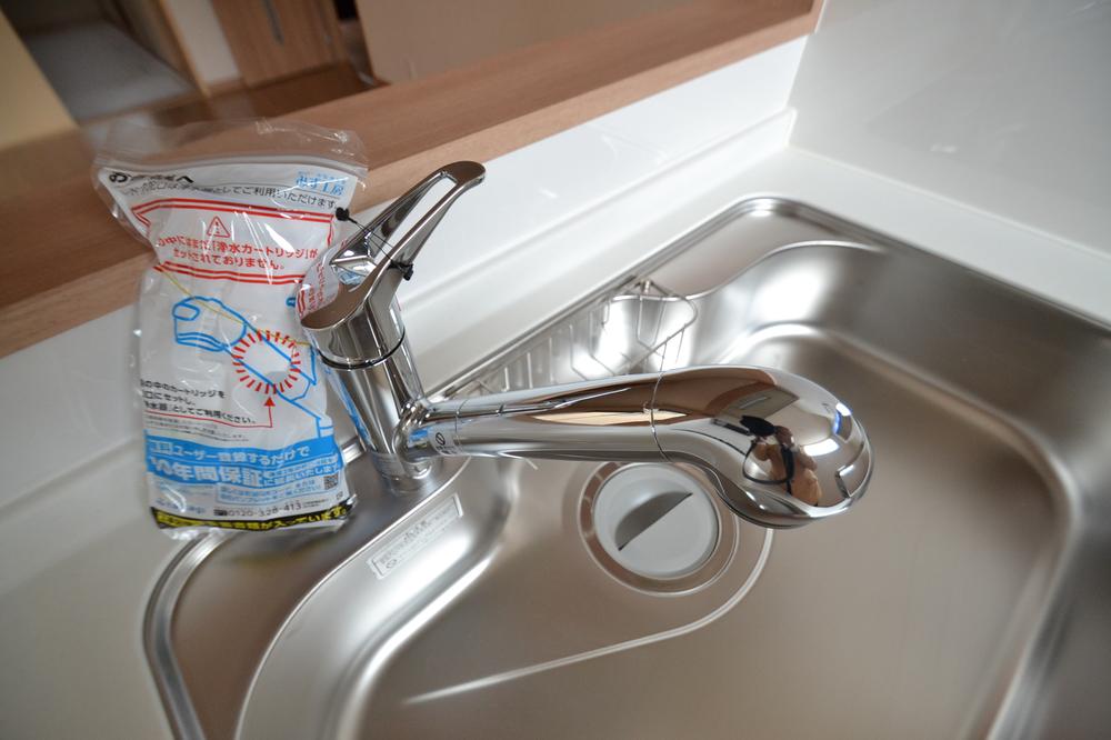 Kitchen. It is with water purifier. Please eat as it is a delicious water.