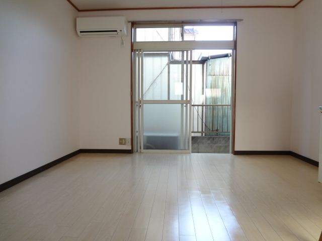 Living and room. White floor is a stylish room.