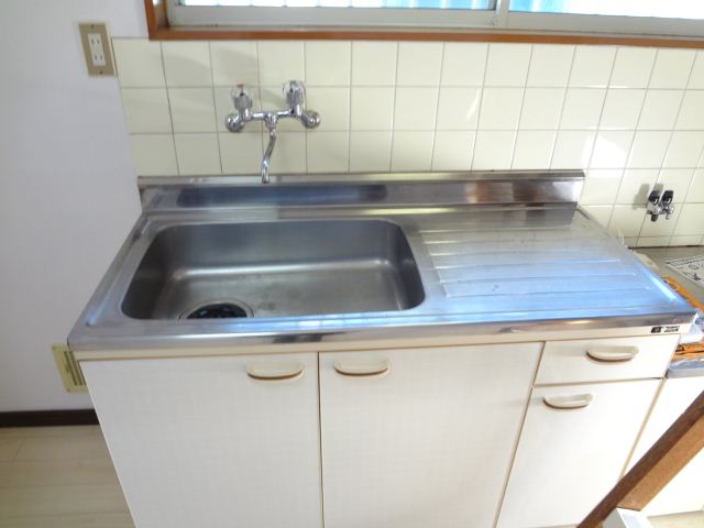 Kitchen. It is a wide bench kitchen.