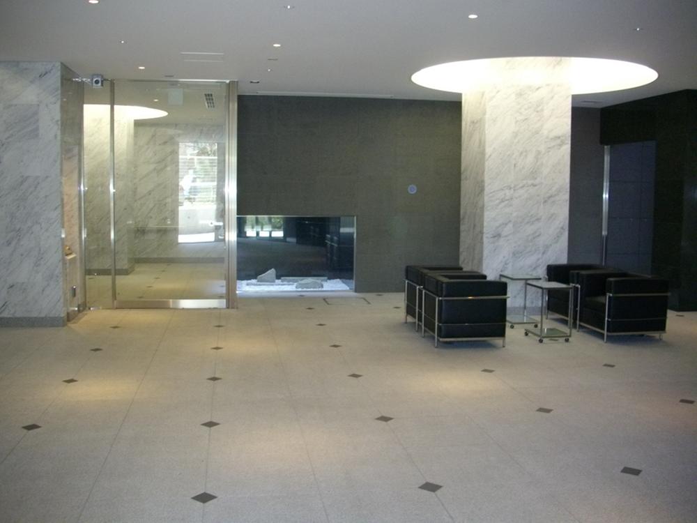 lobby. The entrance hall use the granite and marble everywhere. We arranged a rock garden in the back.