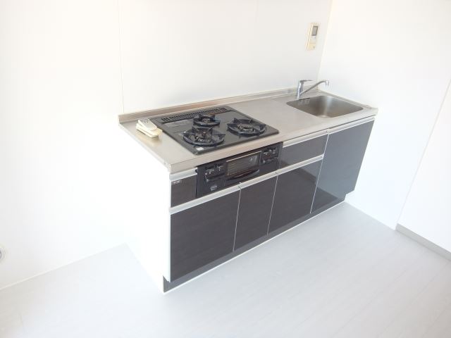 Kitchen. It is a three-necked stove system Kitchen