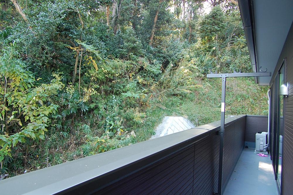 Balcony. Wind that reaches to slip through the green is very refreshing.