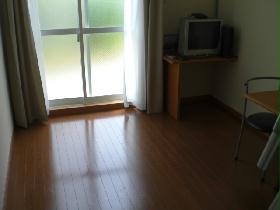 Living and room. It is a photograph of the same properties of different room