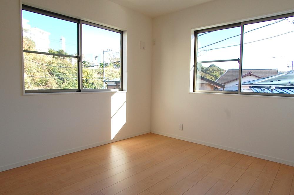 Non-living room. It overlooks the lush greenery of Zushi from upstairs window. 
